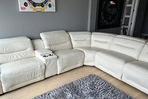 Cleaned white leather sectional sofa